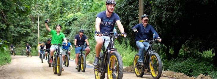 group of people riding on e-bikes