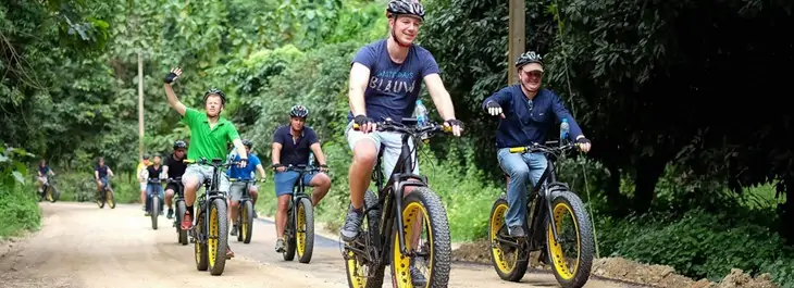 group of people riding on e-bikes