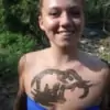 Girl with elephant mud tattoo
