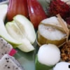 close up of tropical fruits and snacks