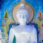 buddha statue inside blue temple wat rong seua ten