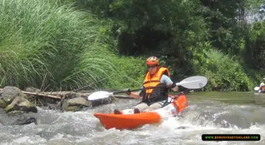 kayaking through chiang dao jungle river