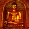 golden buddha statue inside temple