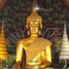 golden buddha statue inside temple