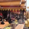 people making merits at doi suthep temple