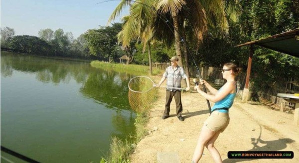 couple fishing in lake