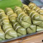 traditional thai sweet wrapped in banana leaf