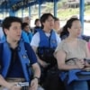 people on boat to laos
