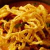 close up of khao soi gai in a bowl