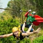 woman ziplining at jungle flight