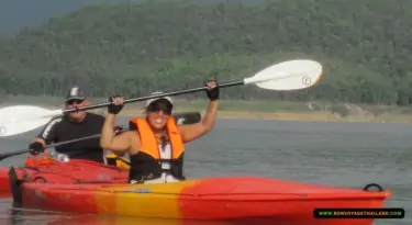 couple kayaking through a lake