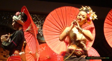 thai classical performance with umbrellas