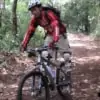 young man mountain biking