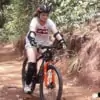 young woman mountain biking