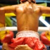close of of boxer performing traditional ritual (Ram Wai Kru) before boxing match