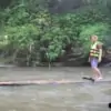 traditional thai rafting alove a river