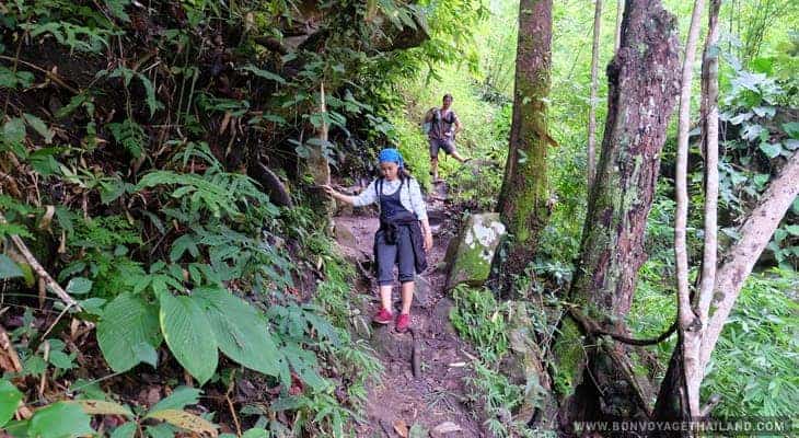 trekking through waterfal trail on doi inthanon