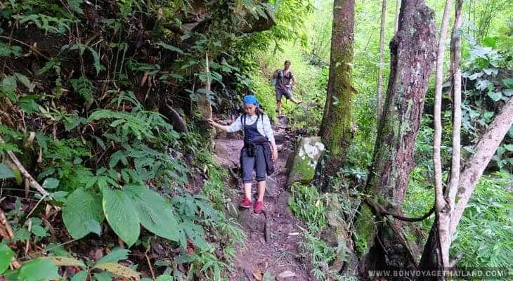 trekking through waterfal trail on doi inthanon