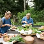 learning how to prepare herbs and vegetables