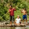 traditional bamboo rafting along river
