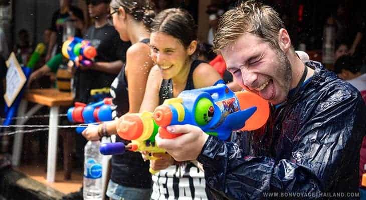 water gun fighting during songkran festival in chiang mai