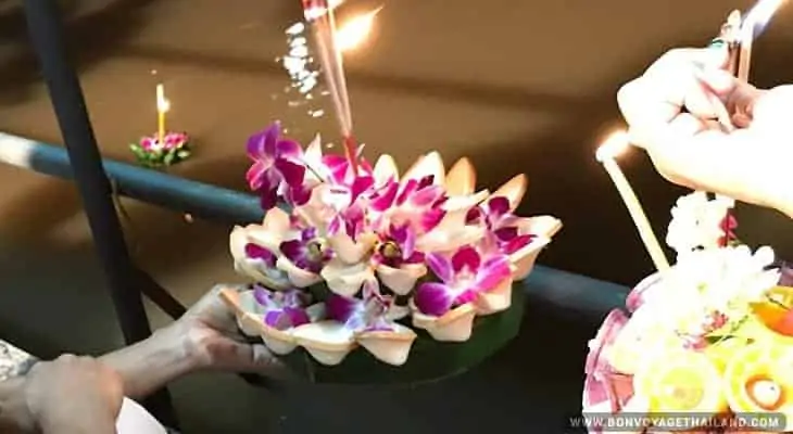 floating krathong in river during loy krathong festival